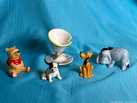 Front view of all five figurines