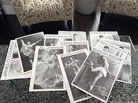 Spread showing 10 signed ballet photographs