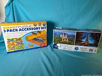 Accessory kit box and 2-puzzle box front