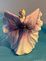 Front view of Royal Doulton Isadora figurine showing gown coloring and pose