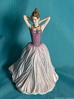 Front view of Royal Doulton Mollie figurine