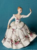Front view of Royal Doulton Shirley HN2702 figurine