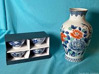 Vase and boxed set of four bowls