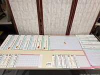 All cutting mats laid out on table showing quantity and sizes