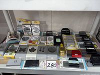 Shelf view of 28 EK Success and EK Tools punches assorted styles