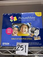 Retail box front showing PictureMate branding and model