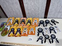 All 21 paper punches laid out showing packaged and loose pieces