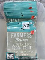 Multiple sealed Hampton Art stencil packs in tote