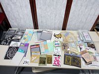 Table view showing full assortment of dies, folders, stencils and stickers