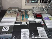 Full lot on shelf showing all sealed accessory packs