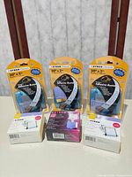 Front view showing three adhesive runner dispensers and three cartridge boxes