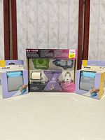 Full lot: central Multi-Tool Value Pack flanked by two adhesive runners