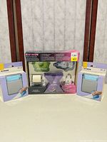 Full lot showing Xyron value pack and two adhesive runner boxes