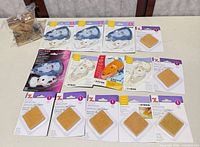 Group shot showing all Xyron adhesive runners, refill cartridges and eraser pads