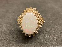 Front view of opal and diamond ring