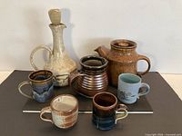 Group view of seven studio pottery pieces