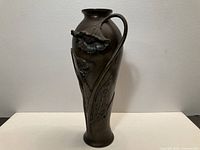 Full front view showing overall form and handle