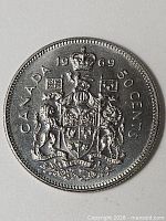 Reverse showing CANADA 1969 50 CENTS and coat of arms