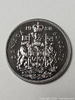 Reverse showing Coat of Arms and denomination