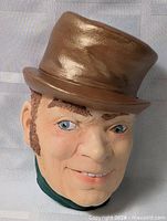 Front view of Bossons chalkware man head