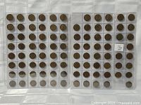 Two binder pages filled with Lincoln Wheat Cents