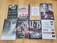 Top view of eight book fronts displaying titles and authors