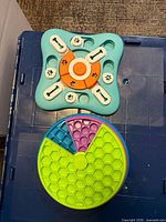 Both dog puzzle toys together