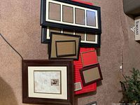 Group view of all picture frames on floor