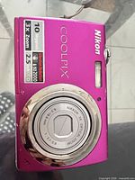 Front view showing lens, branding, 10 MP and 3x zoom labels