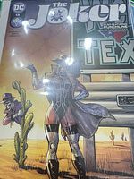 Front view of The Joker #13 variant cover in bag and board