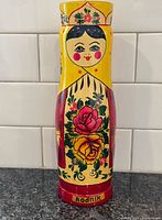 Front view showing face, floral design and Rodnik name