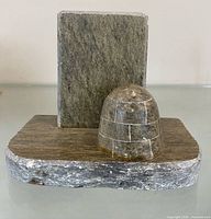 Front view showing igloo hut, back plate and base