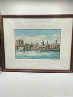 Frontal view of framed watercolor showing full artwork and frame