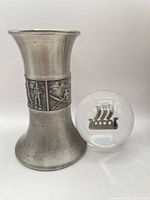 Pewter vase and glass paperweight showing Viking motifs
