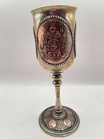 Full view of goblet showing overall form and medallion with imperial coat of arms