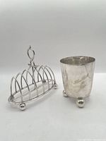 Toast rack and tumbler side by side