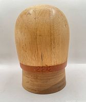 front view of hat block showing dome and band