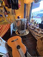 Full view of stainless steel cylindrical kiln on stand