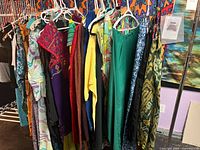 Rack showing multiple garments of varied colours and styles