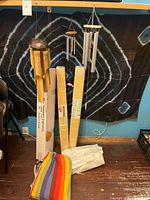 group shot showing hammock, windchimes, bamboo blinds, beaded curtain