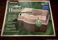 Retail box front displaying Holmes Cool Mist Humidifier information and capacity