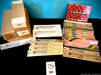 All incense boxes, packs and sealed oil box arranged on table