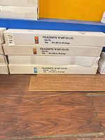 Stack of three Folkcrafts "N'Art Co. Ltd." boxed bamboo curtains showing size and branding