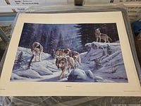 Full view of entire unframed print showing wolves in snowy landscape