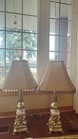 Full view of both matching lamps on window sill
