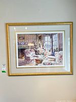 Front view of framed print on wall