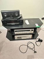 Overall view of receiver, cassette deck, stand, cables