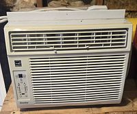 Front view of Danby window air conditioner showing grille, louvers, control panel, branding