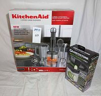 Both boxed items: KitchenAid 5-speed hand blender set and Granitestone Multi Chopper Pro