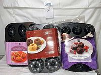 Three packaged Nordic Ware mini pans: Decorated Egg, Garland Bundt, Bundt Brownie